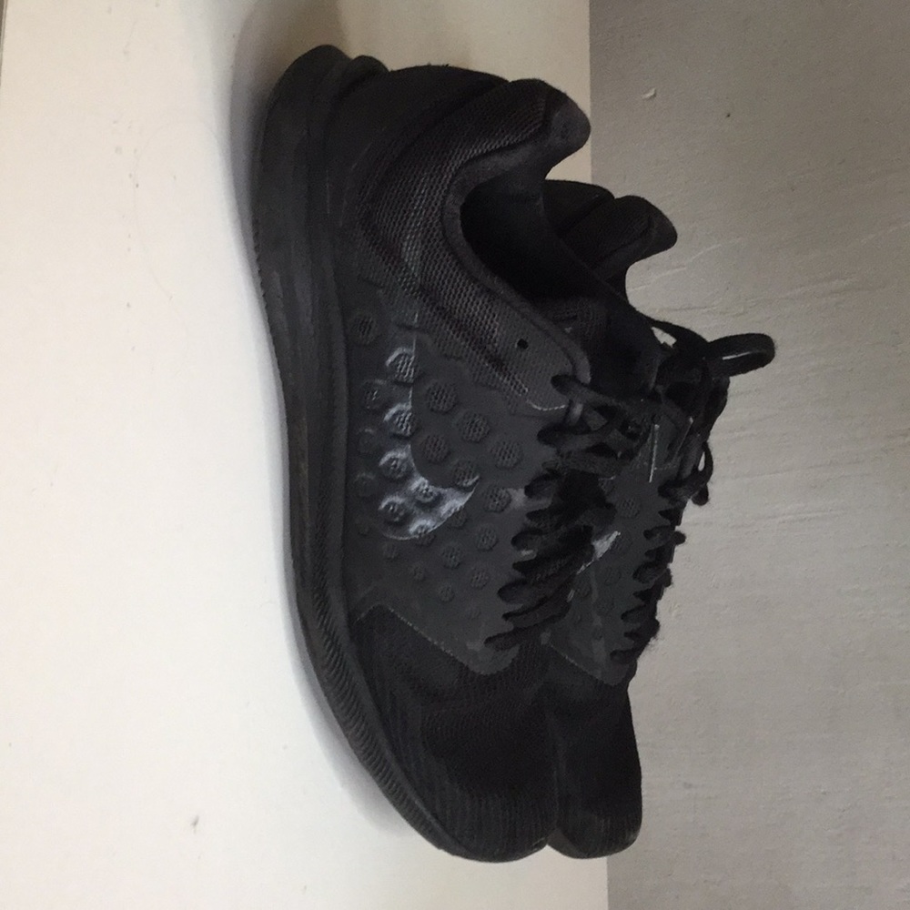 Black Nike running shoes